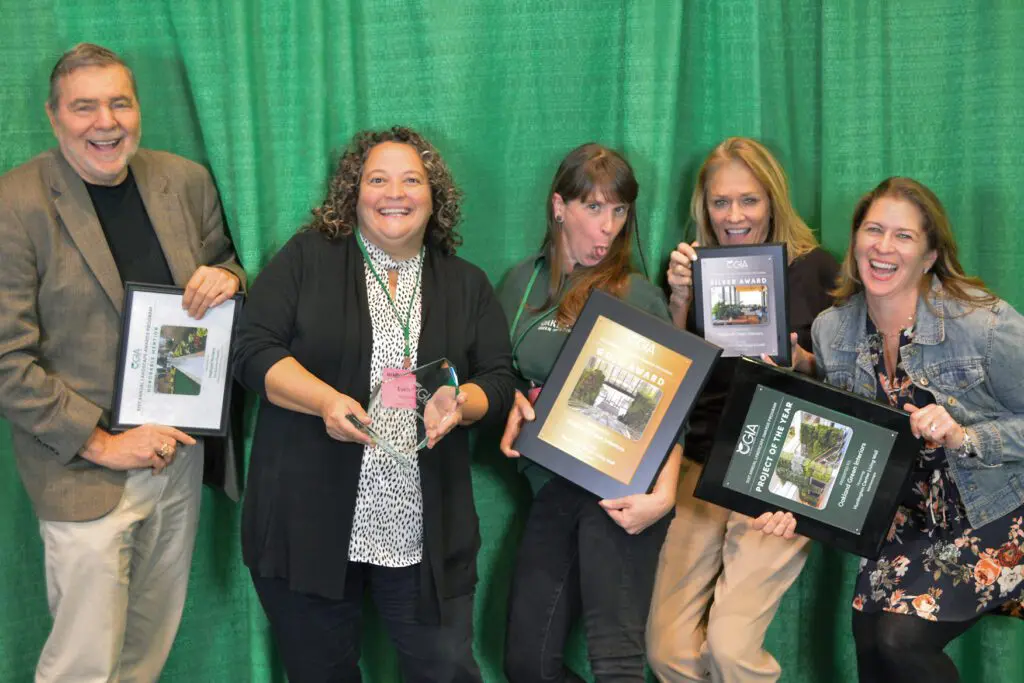 Award ceremony setup with decorative plants at Oakland Green Interiors in Columbus, OH