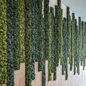 Strips of moss and wood panels across a wall space.