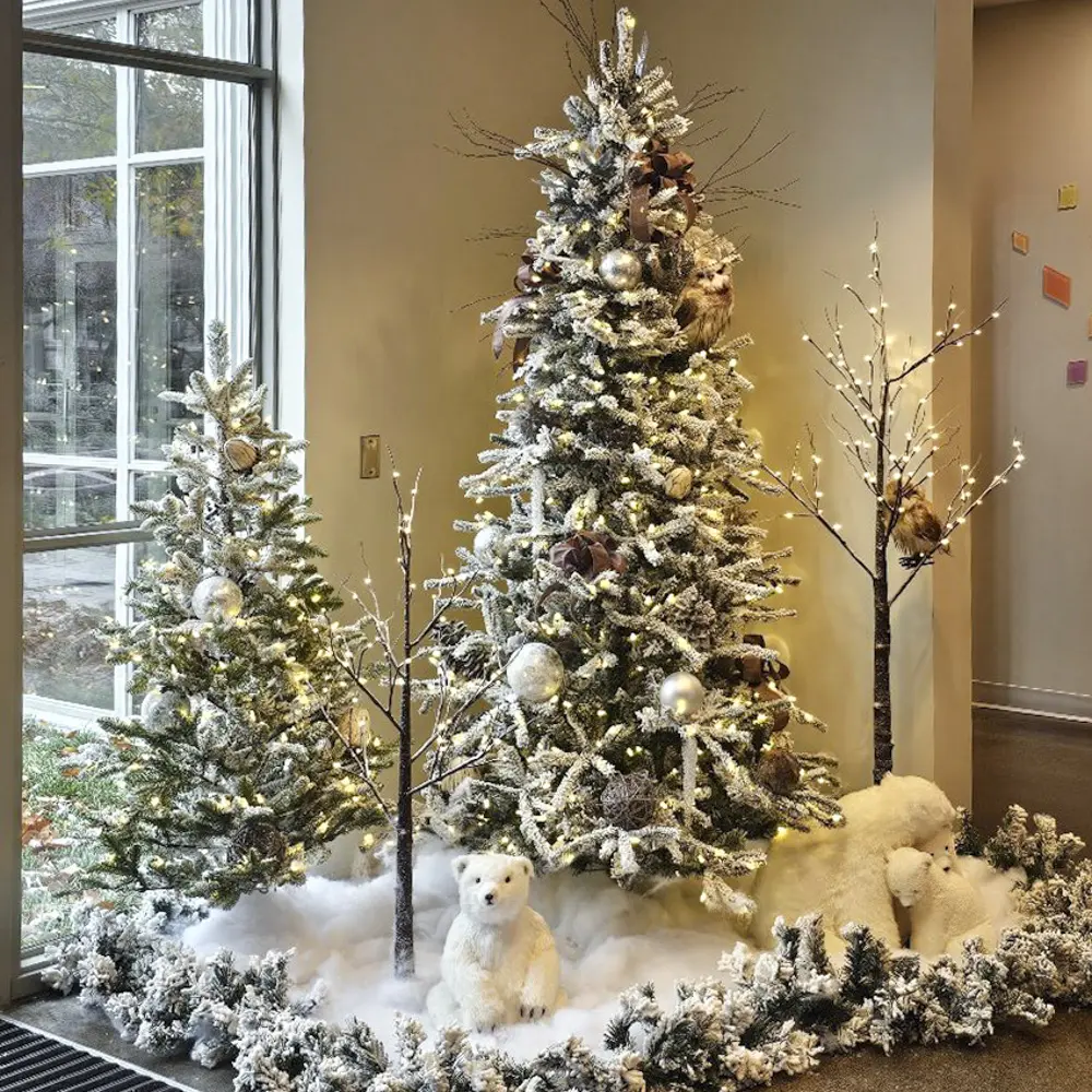 Holiday winter wonderland display at commercial office space.